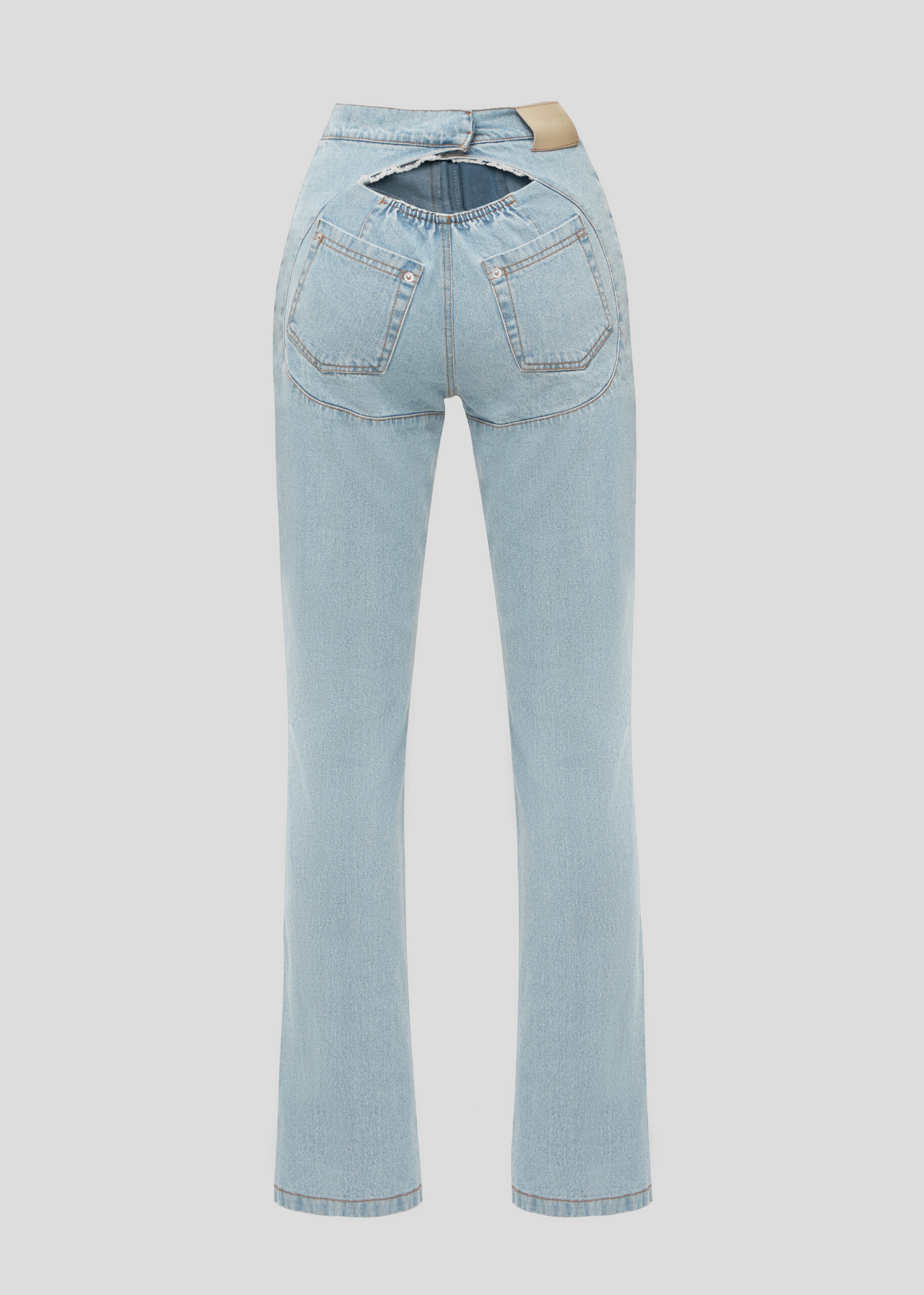 Blue jeans with a cut on the buttocks