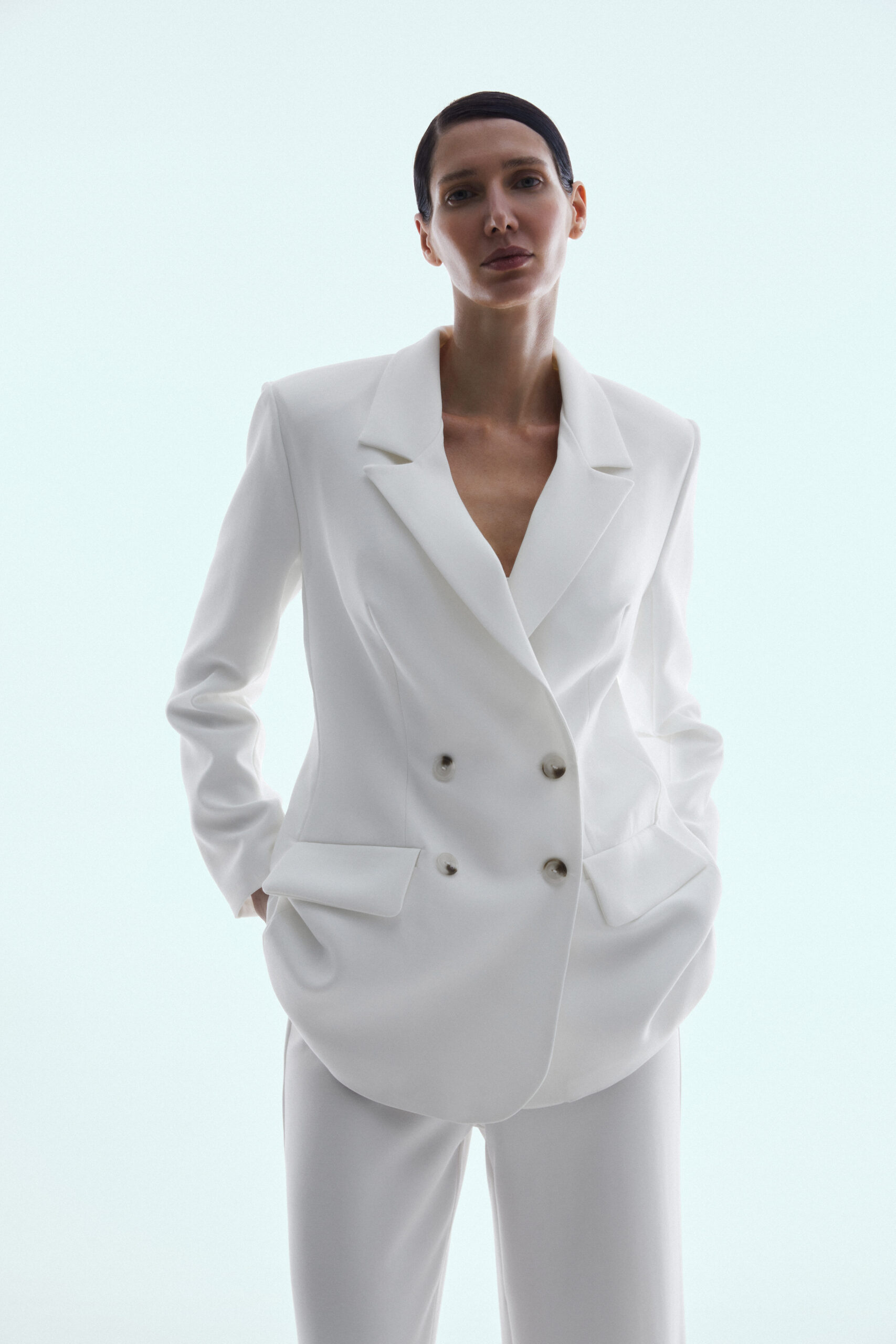 Double-breasted white blazer