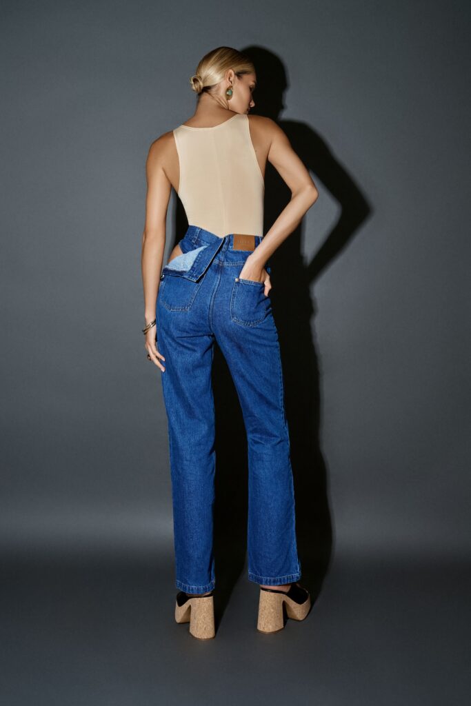Blue jeans with a slit at the thigh