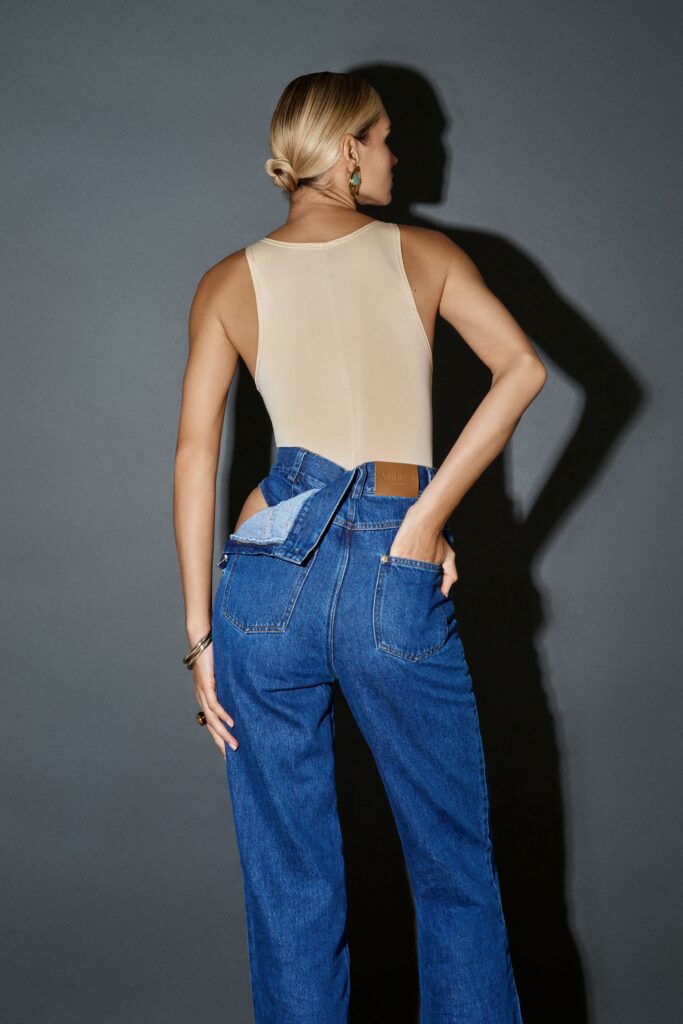 Blue jeans with a slit at the thigh