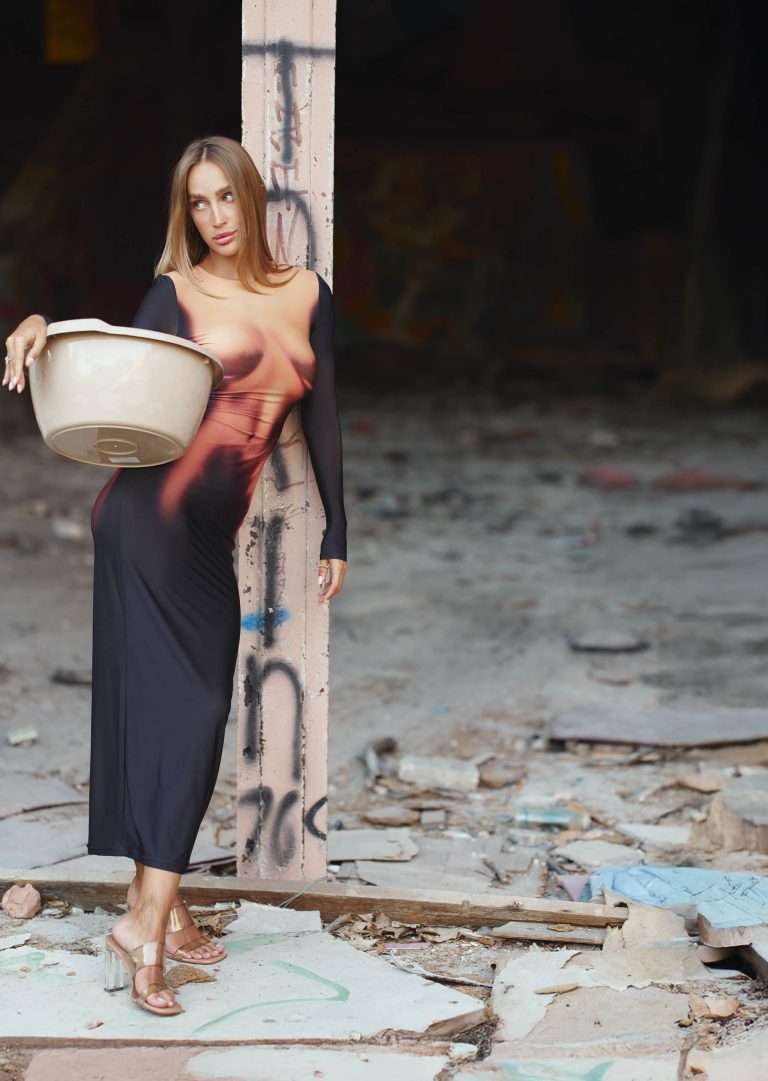 Midi dress with imitation of the female body is black
