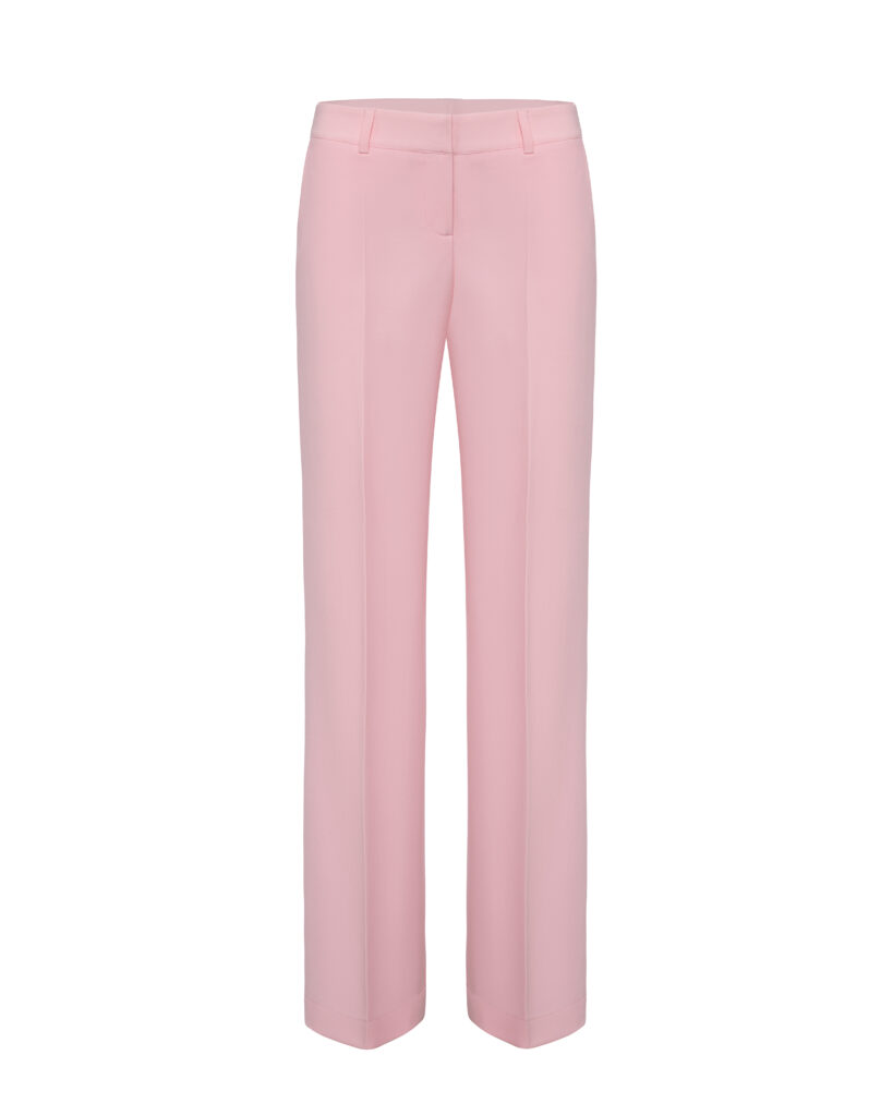 A classic suit with an oversized pink jacket