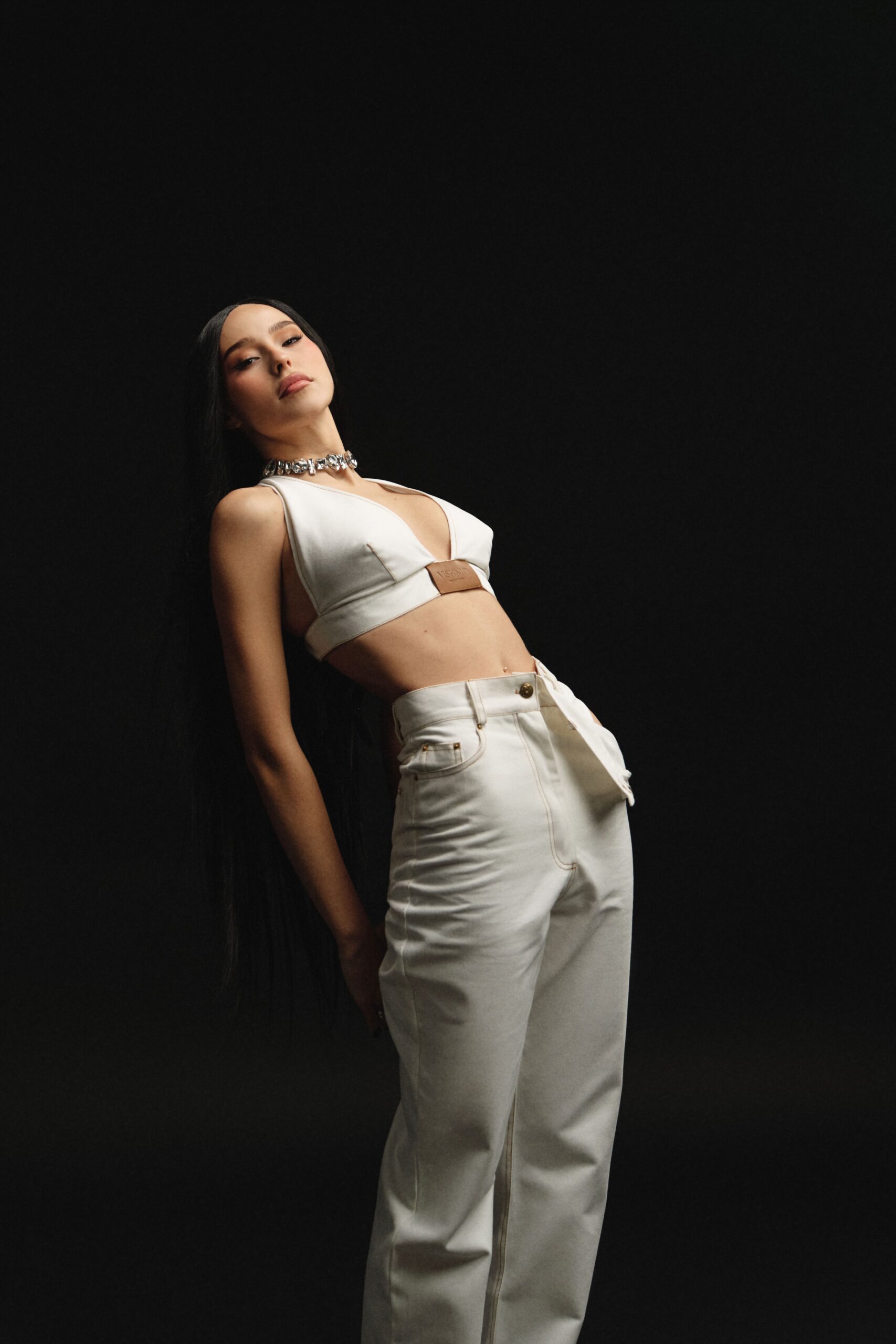 White jeans with a slit at the thigh