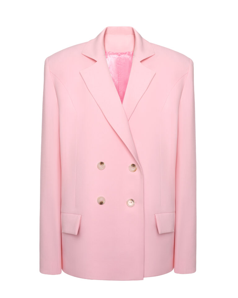A classic suit with an oversized pink jacket