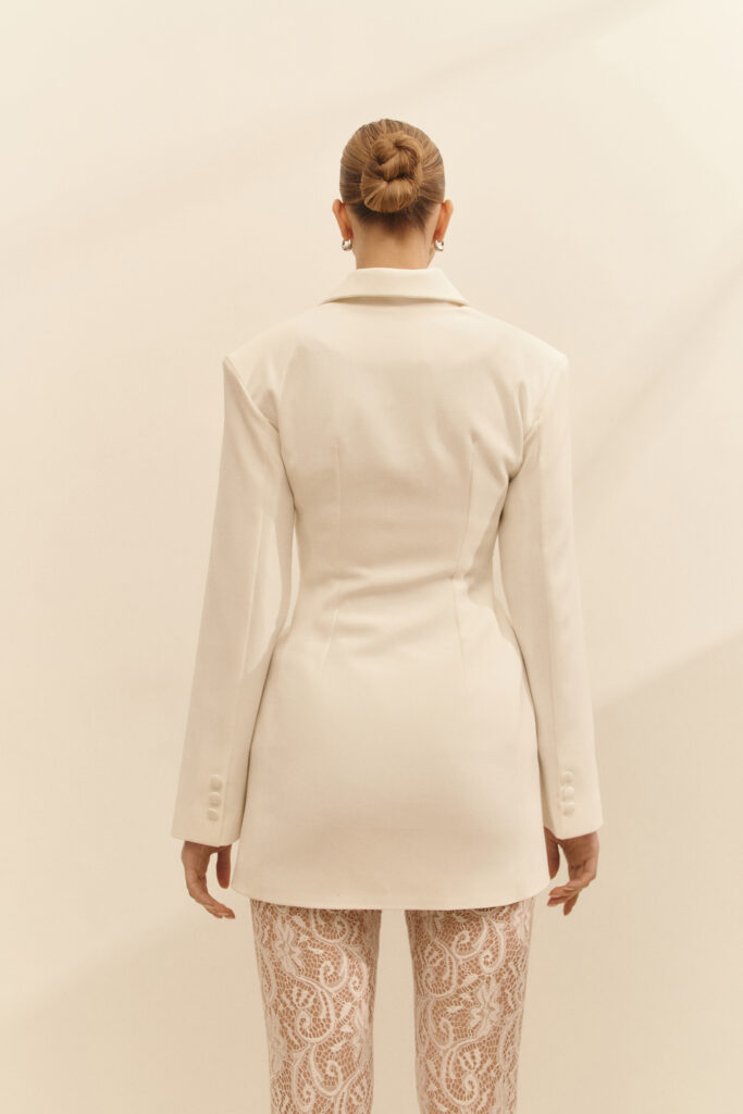 Jacket dress is fitted white