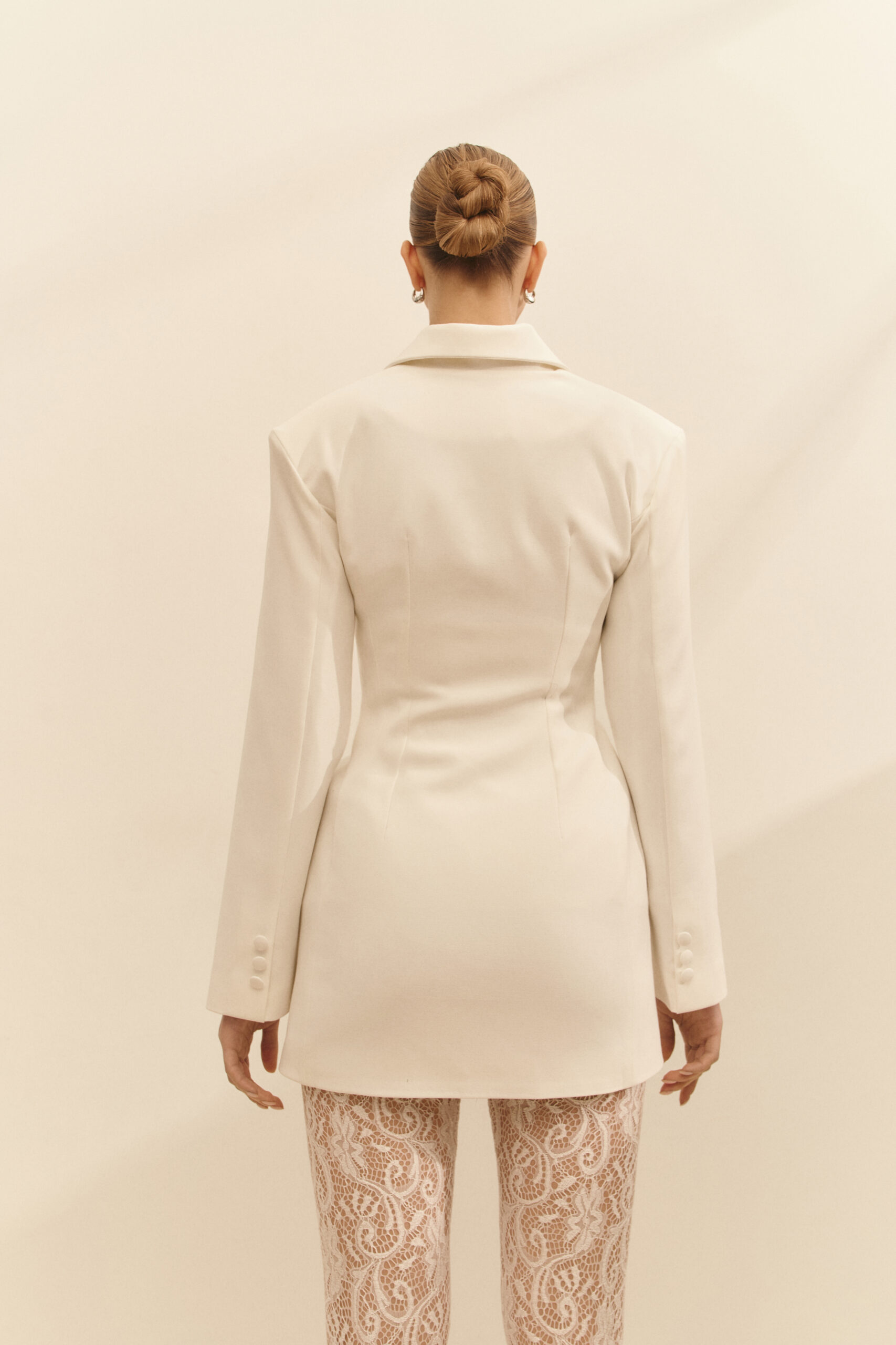 Jacket dress is fitted white