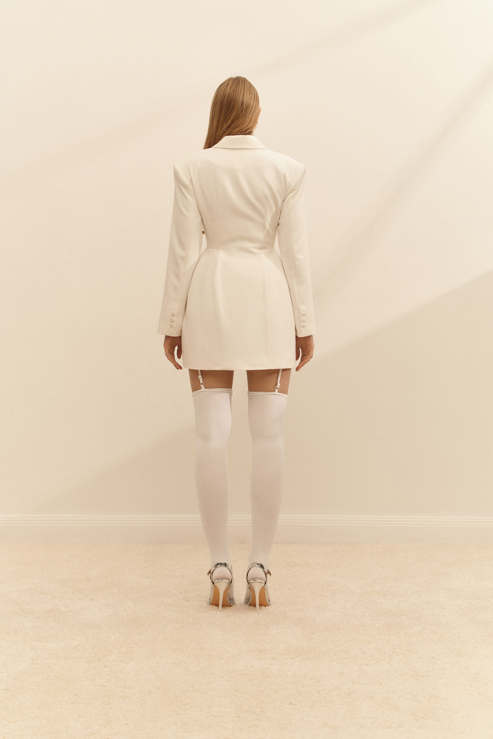 Dress-jacket fitted with white stockings