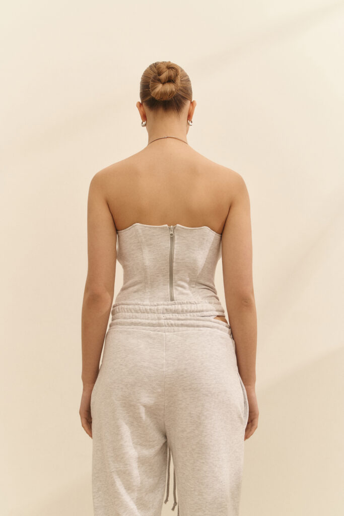 Corset with a zipper is gray