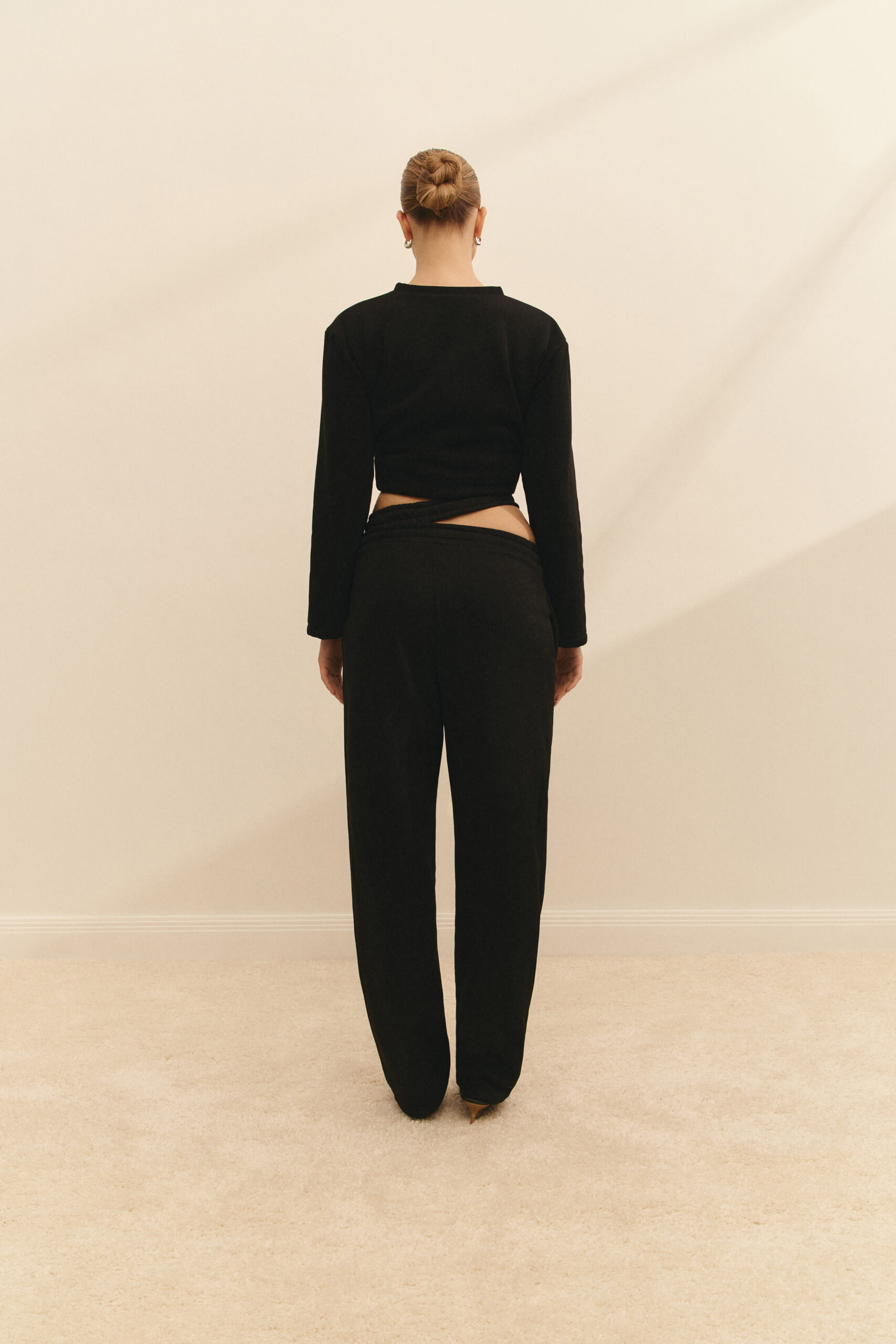 Pants with a high fit are black
