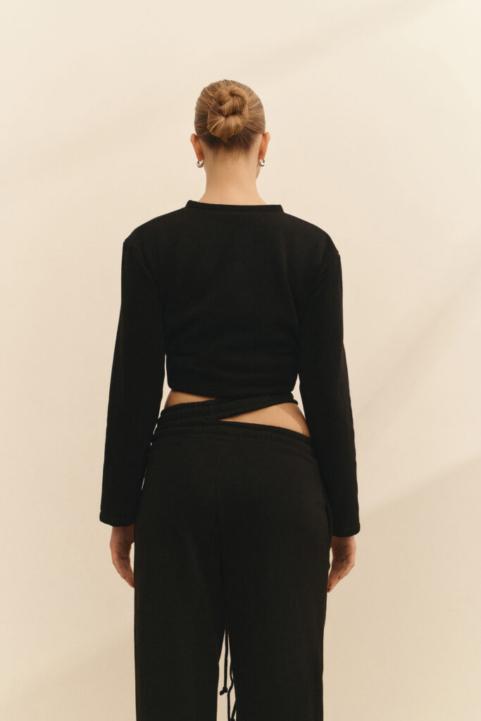 The sweater with a knot is black