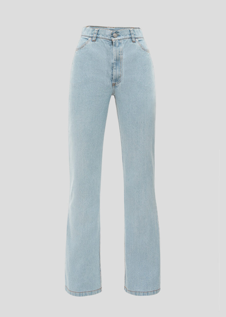Blue jeans with a cut on the buttocks