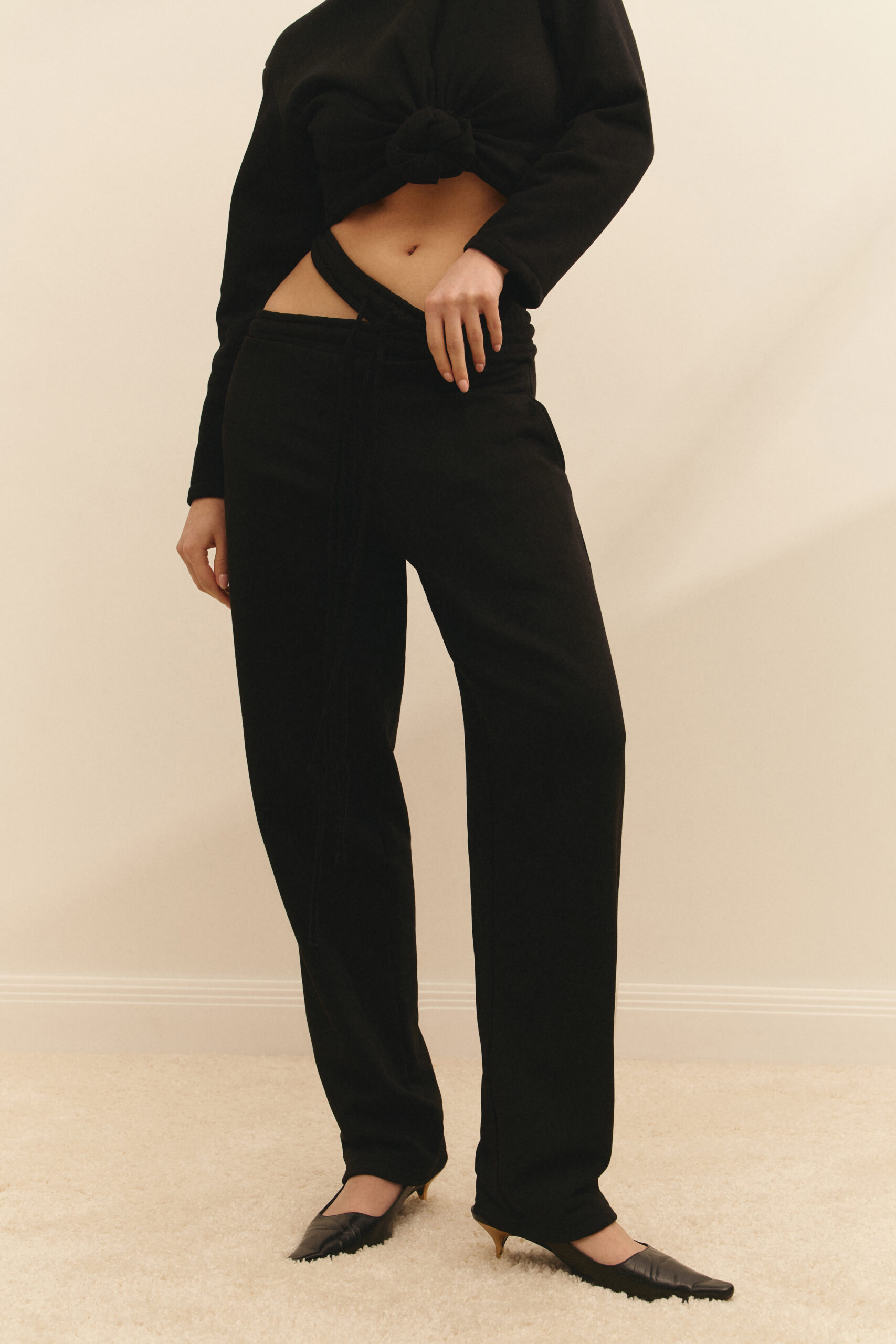 Pants with a high fit are black