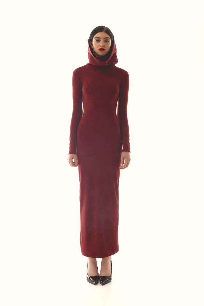 The dress with a hood is burgundy