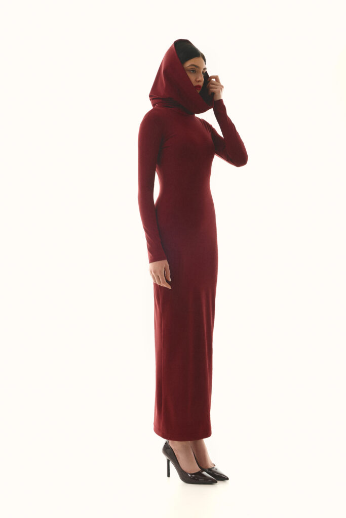 The dress with a hood is burgundy