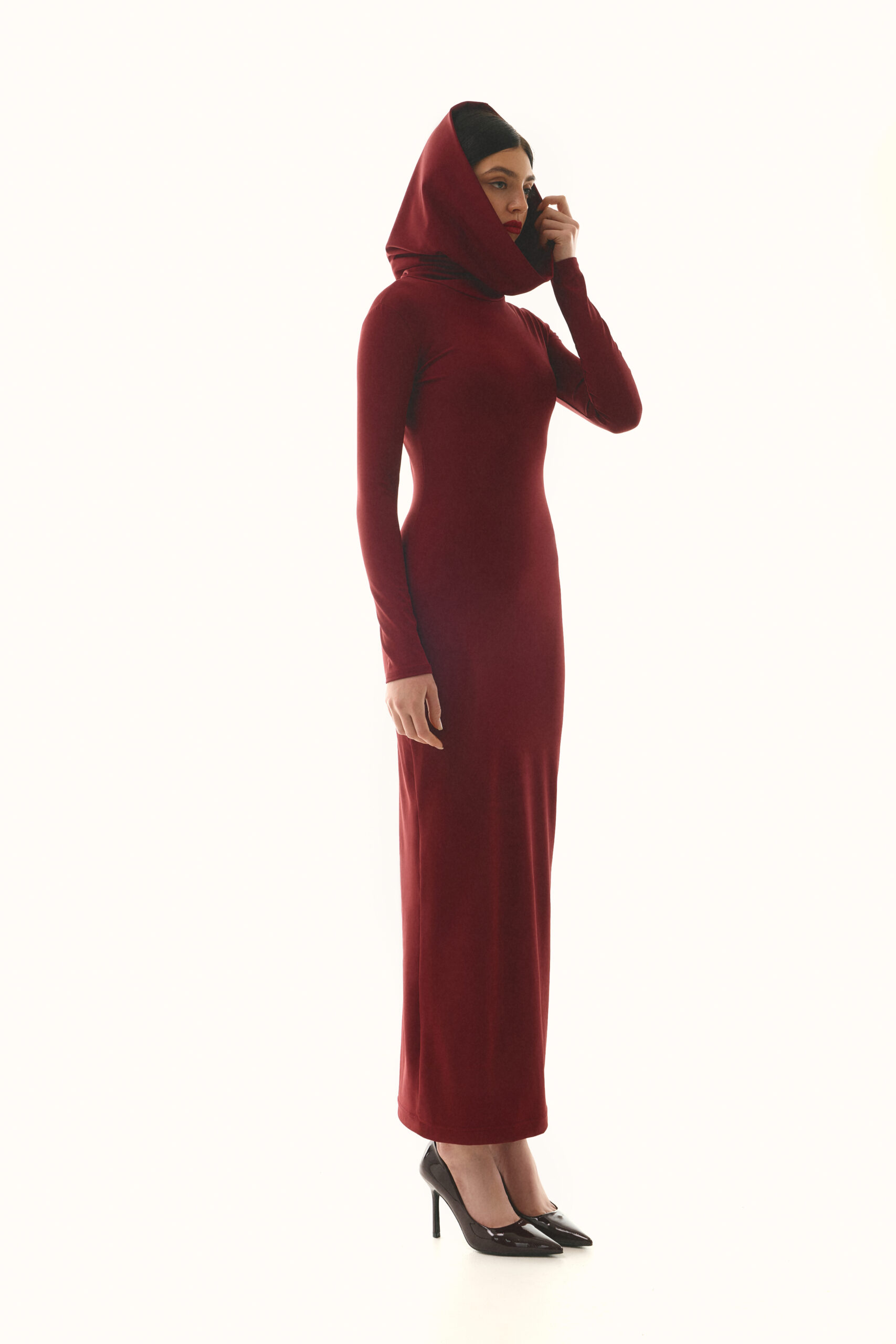 The dress with a hood is burgundy