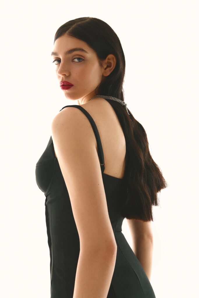 Sheath dress with an accent bodice is black
