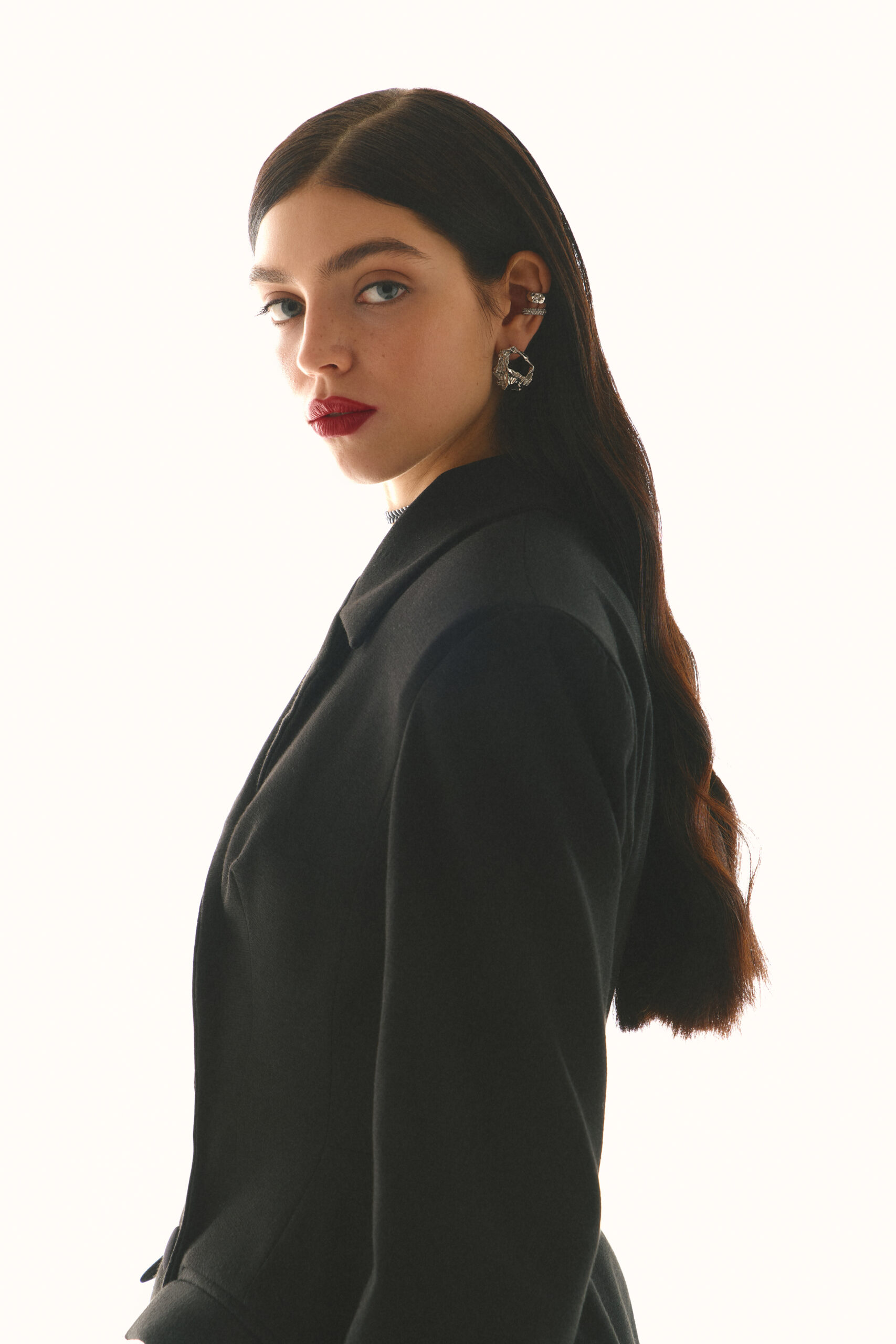 Dress-jacket fitted with black stockings
