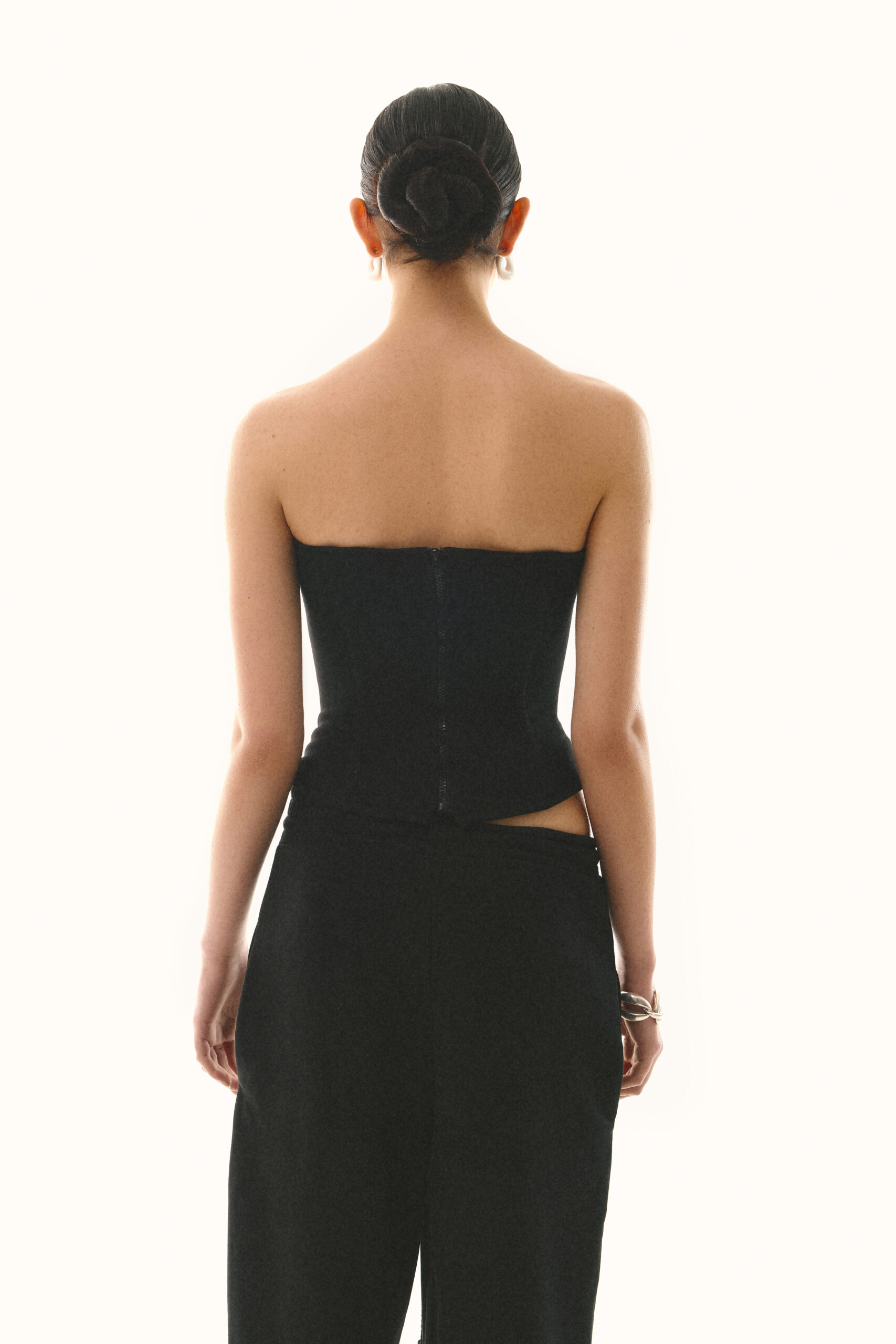 Corset with a zipper is black