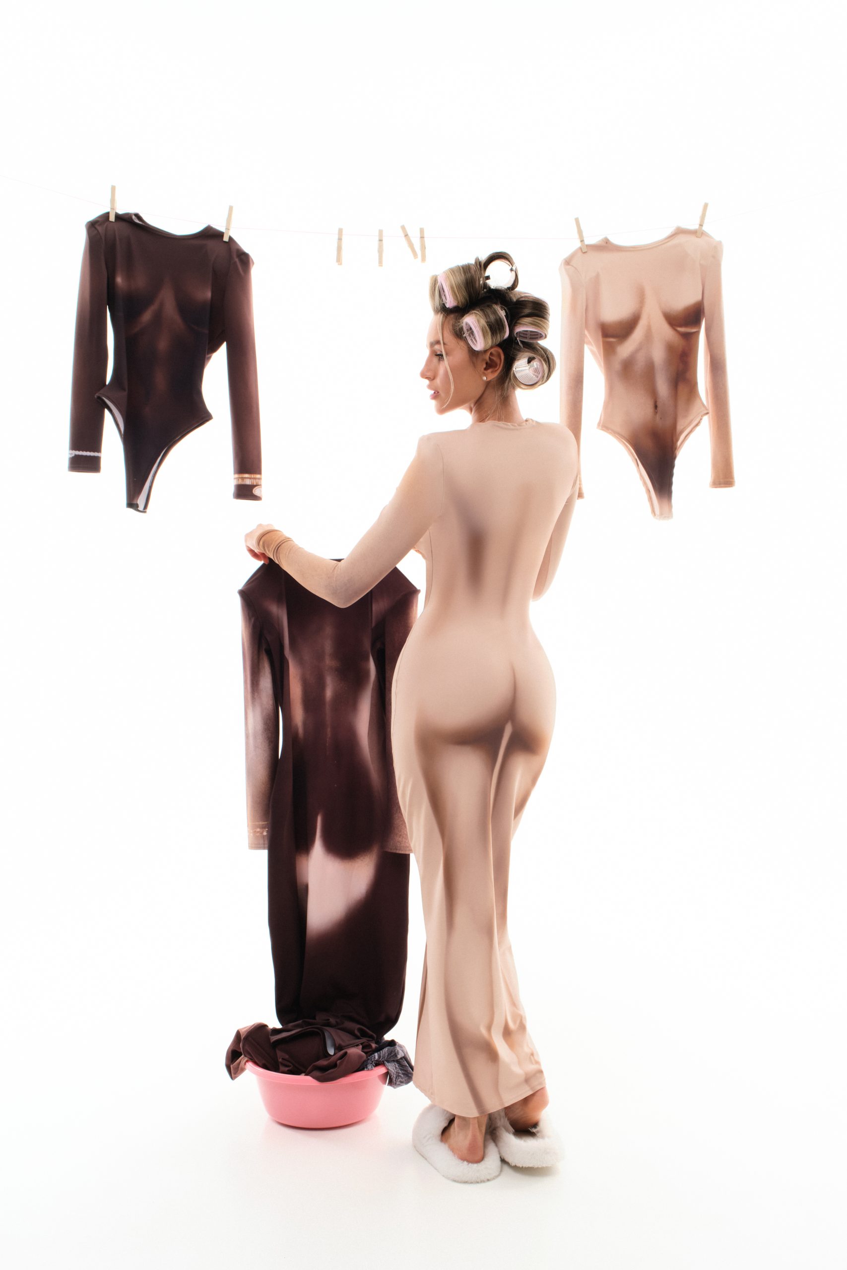 Dress with female body contours and accent bracelets