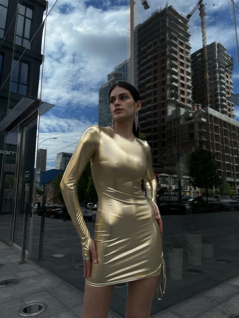 Gold mini dress with ties on the back