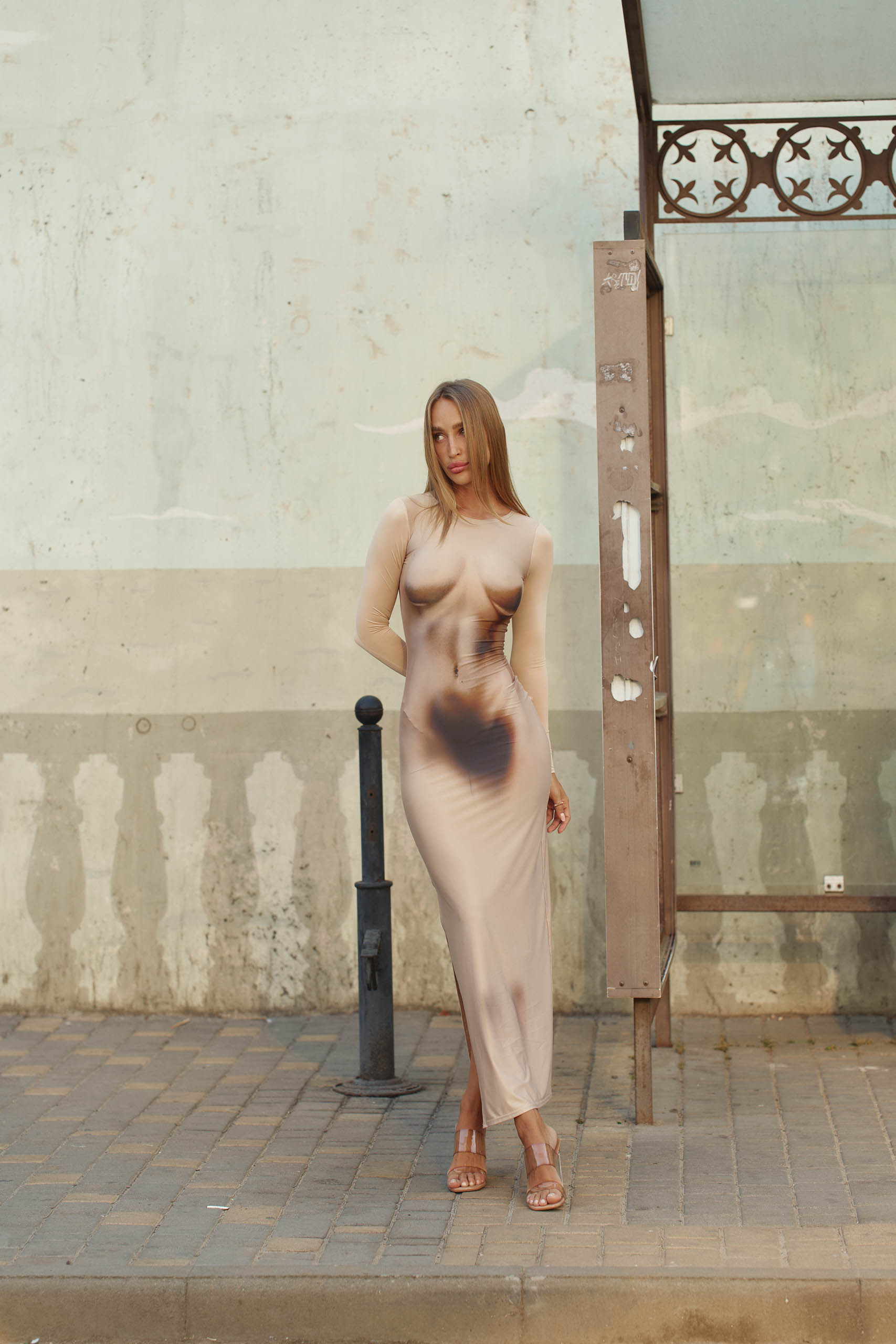 Beige midi dress with a female body print